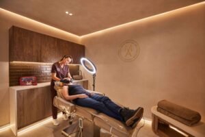 Sculptra injectable treatment session at Manchester Aesthetics showing expert therapist delivering facial rejuvenation procedure