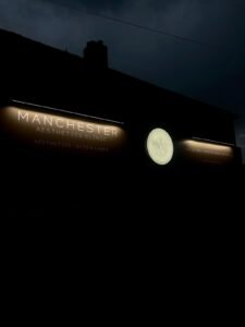 Manchester Aesthetics Clinic exterior at night