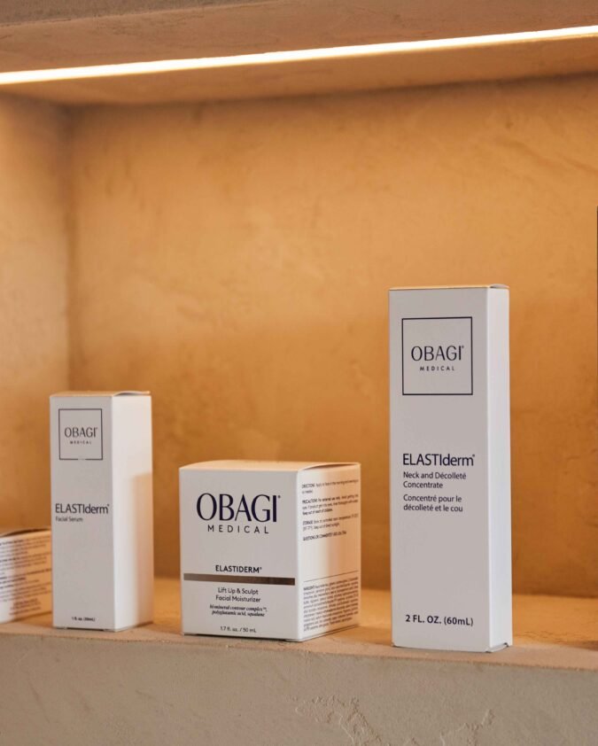 Professional grade Obagi skincare products available at Manchester Aesthetics showing ELASTIderm eye treatment system and clinical results