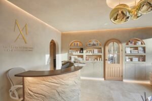 Manchester Aesthetics clinic showing reception desk and treatment displays