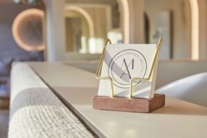 Manchester Aesthetics clinic branding at reception desk